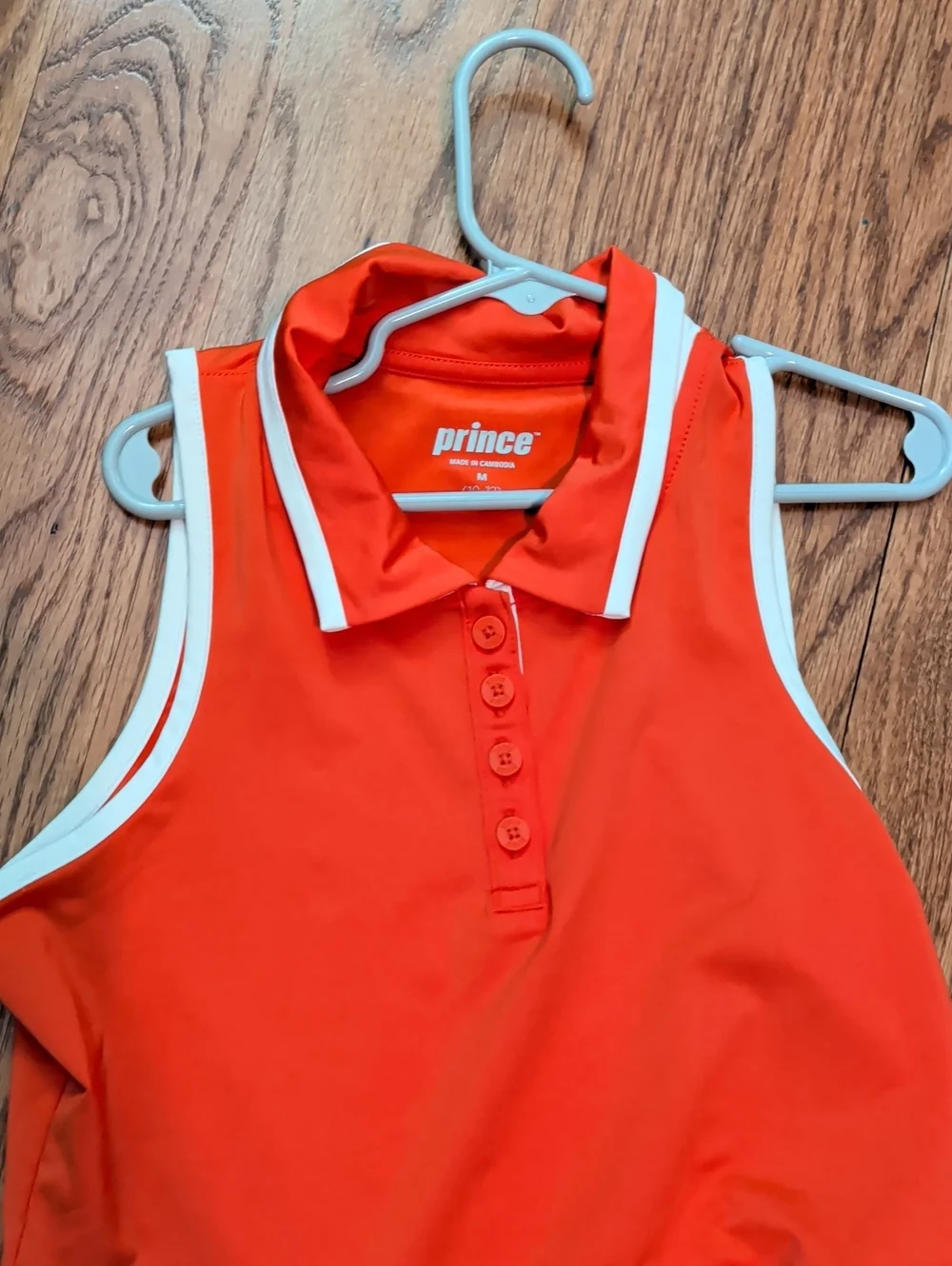 Prince Girls' Sleeveless Polo Dress in Bright Orange with White Trim